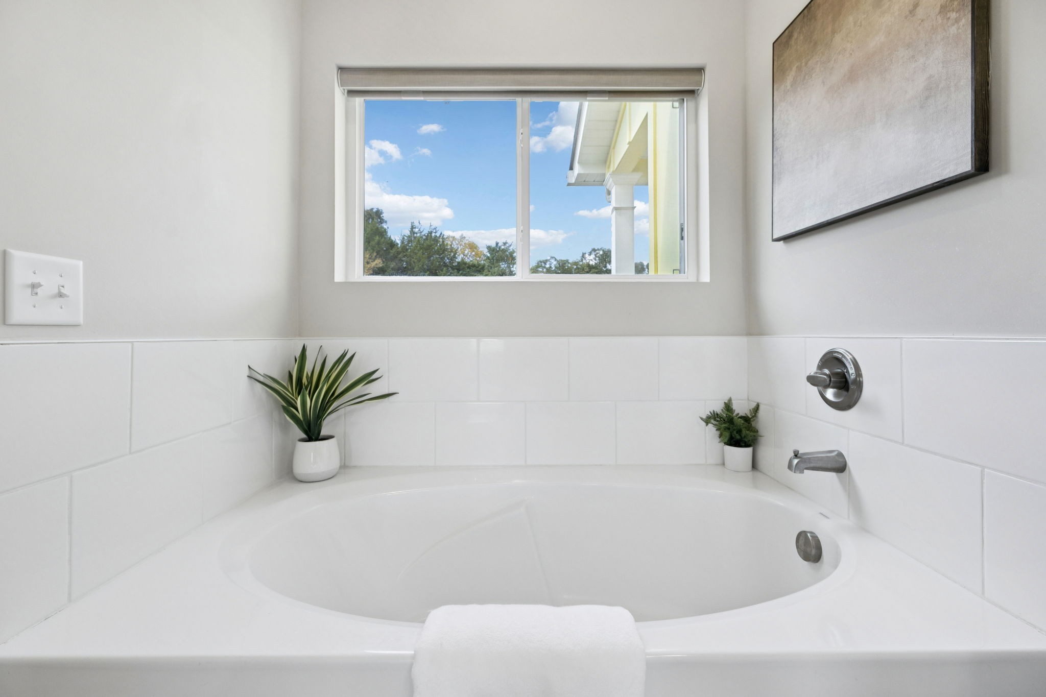 1317 Halls Mill Road Unionville, TN 37180 - Photo 20 of 41 a bathroom with a bathtub and window