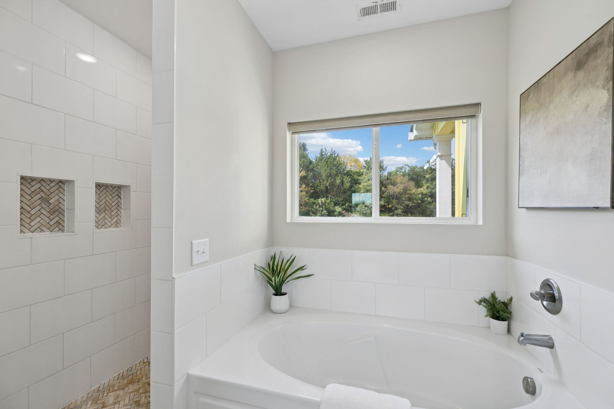 1317 Halls Mill Road Unionville, TN 37180 - Photo 21 of 41 a white bath tub sitting next to a window