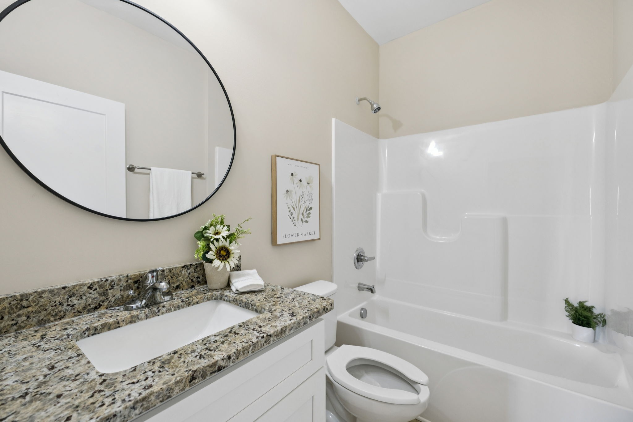 1317 Halls Mill Road Unionville, TN 37180 - Photo 27 of 41 a bathroom with a granite countertop sink mirror toilet and bathtub