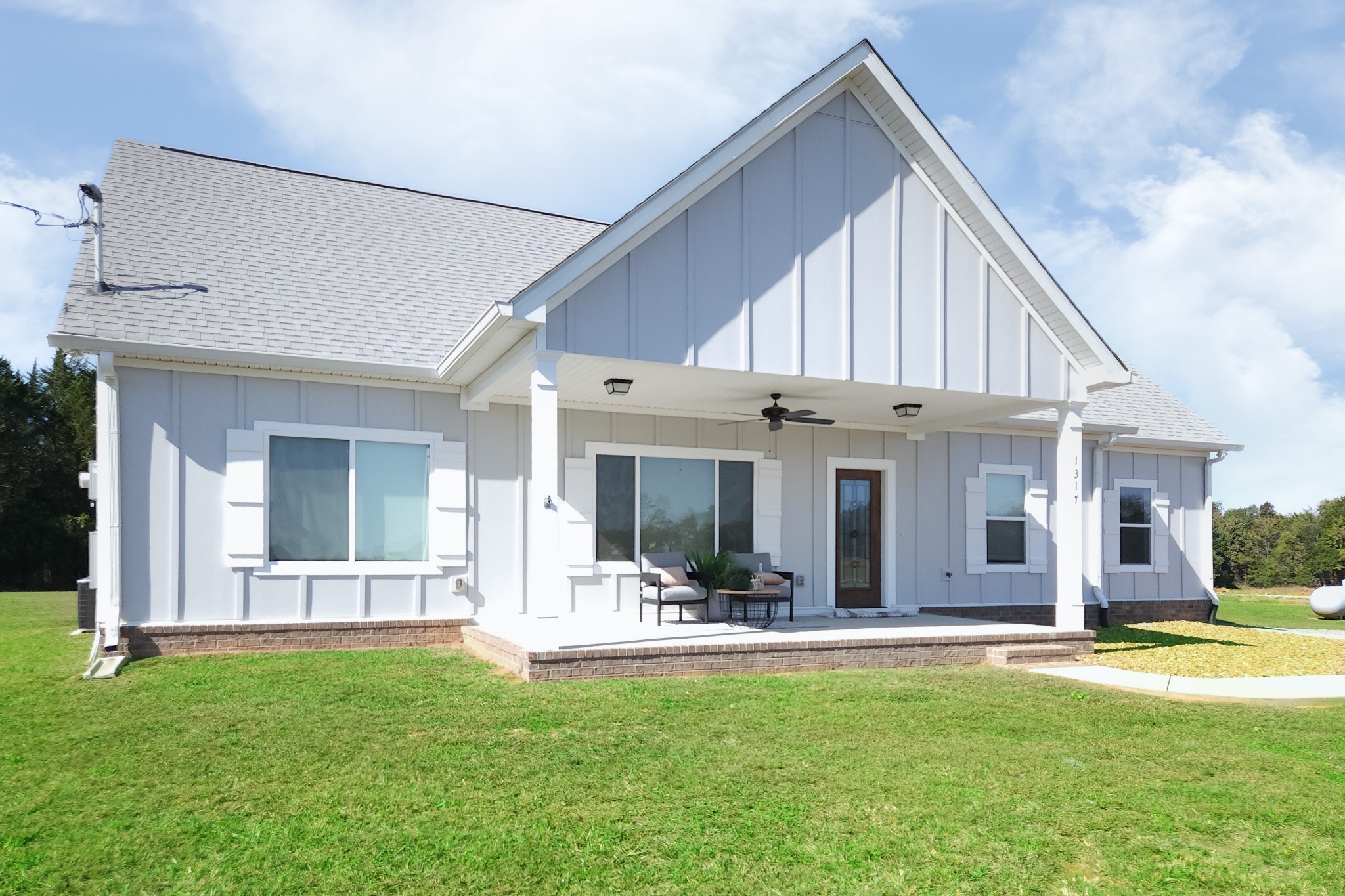1317 Halls Mill Road Unionville, TN 37180 - Photo 3 of 41 a view of a house with sitting area and garden