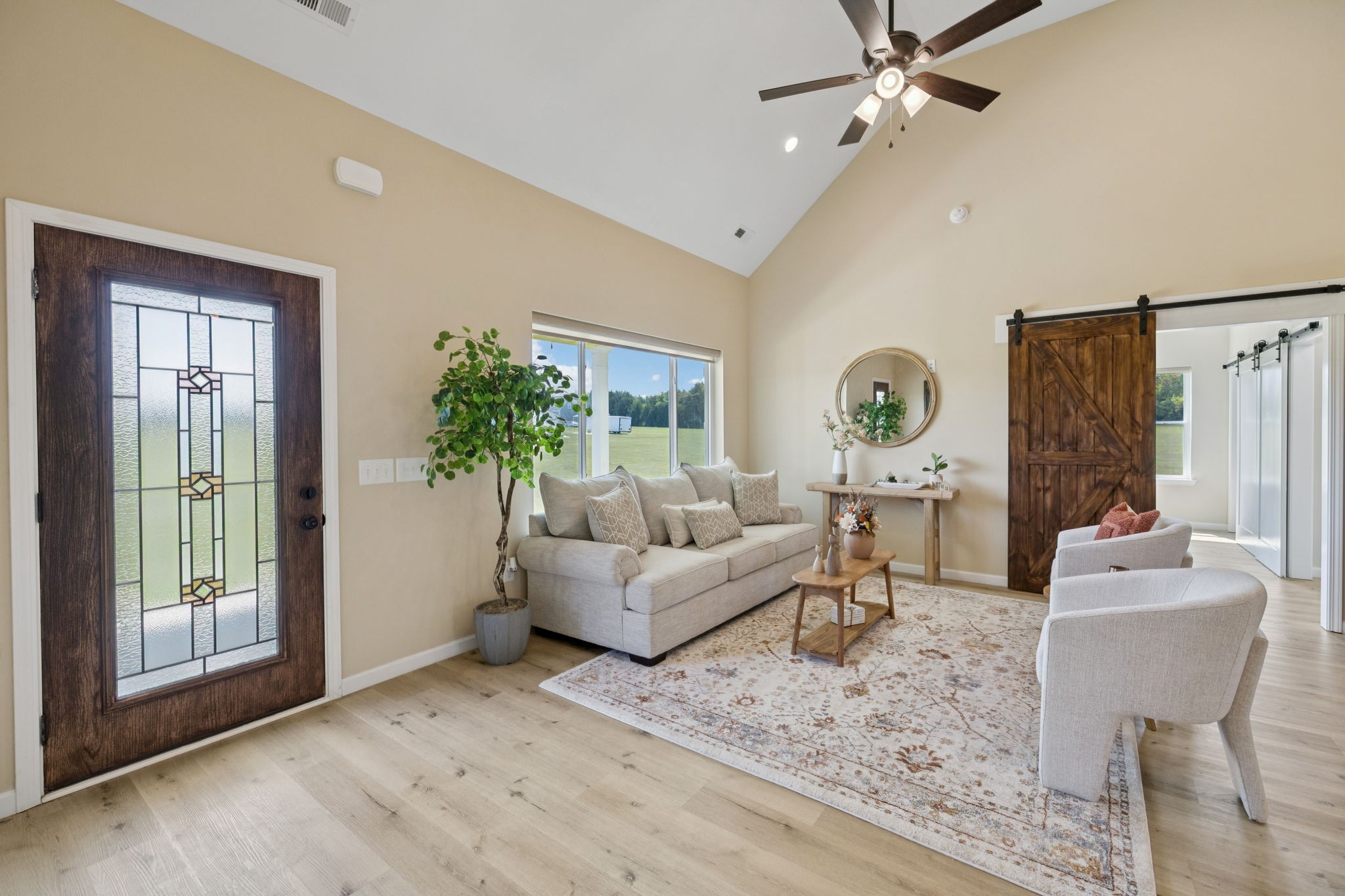 1317 Halls Mill Road Unionville, TN 37180 - Photo 10 of 41 a living room with furniture and a large window