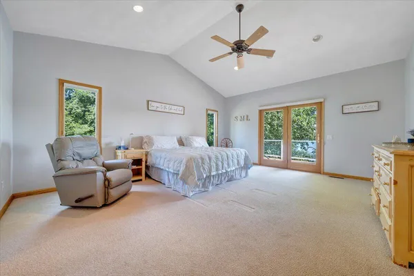 a view of a deck with two chairs and a table