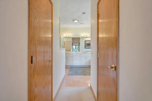 a view of a patio with a chairs and table in patio