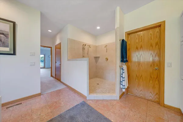 a view of backyard with swimming pool and green space