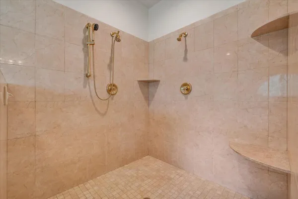 a front view of a house with yard and green space