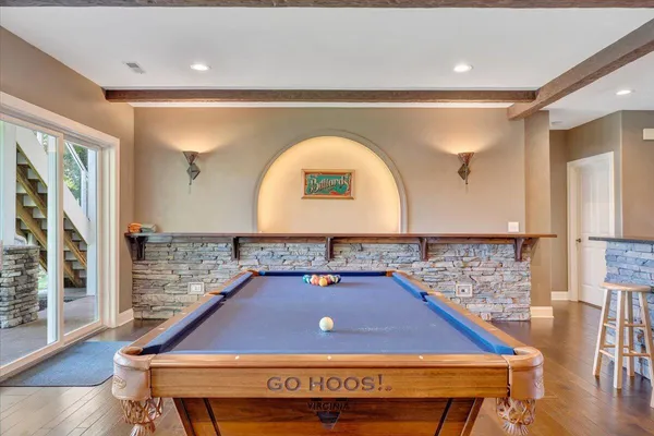 a view of a lake with a house in the background