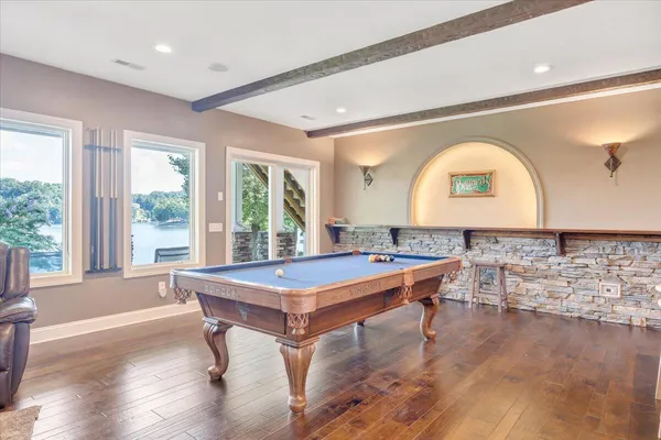 a view of a lake view with a house in the background