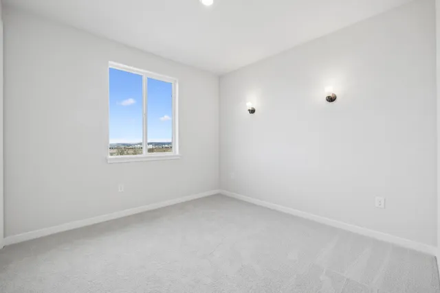a bathroom with a double vanity sink toilet and shower