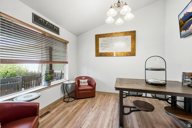 5196 Rodeo Circle Oakley, UT 84055 - Photo 27 of 57 Bright interior space featuring wood-finish flooring and a large window with horizontal blinds