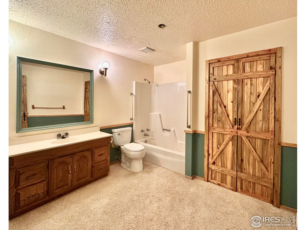 2004 Bonner Springs Ranch Road Laporte, CO 80535 - Photo 25 of 40 Downstairs bathroom with large storage/linen closet