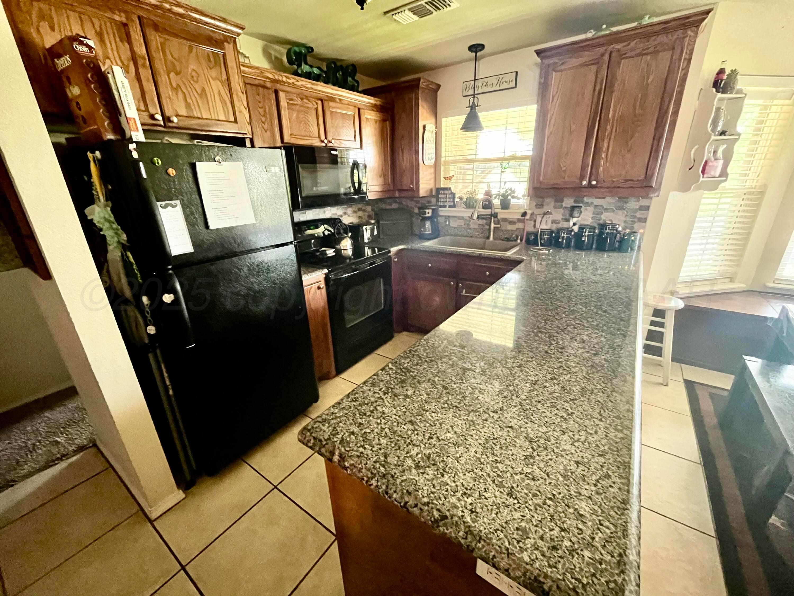 4408 South Williams Street Amarillo, TX 79118 - Photo 7 of 27 IMG_3332