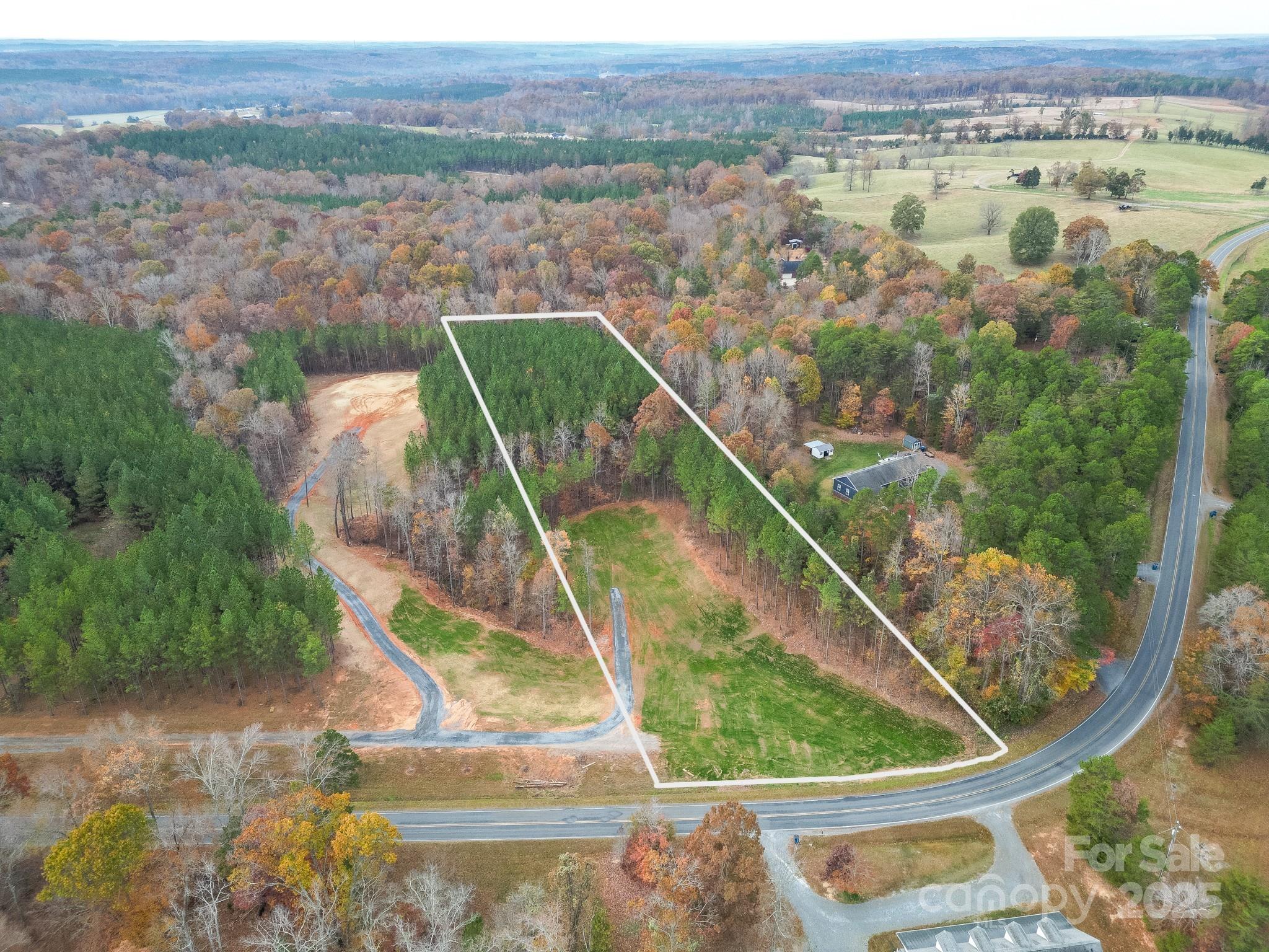 10300 Fink Road, Unit 1 Mount Pleasant, NC 28124 - Photo 3 of 7 an aerial view of lake