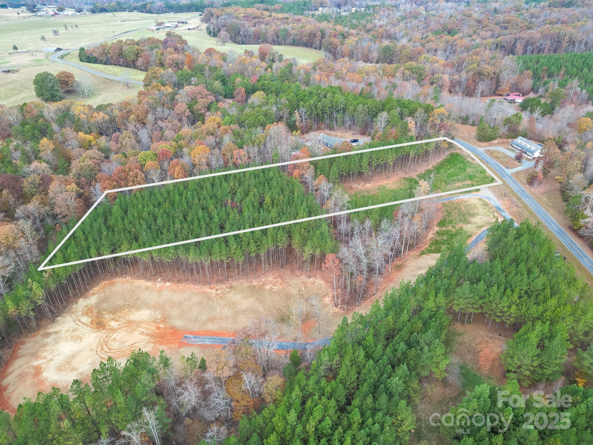 10300 Fink Road, Unit 1 Mount Pleasant, NC 28124 - Photo 4 of 7 a view of a yard with a lake view