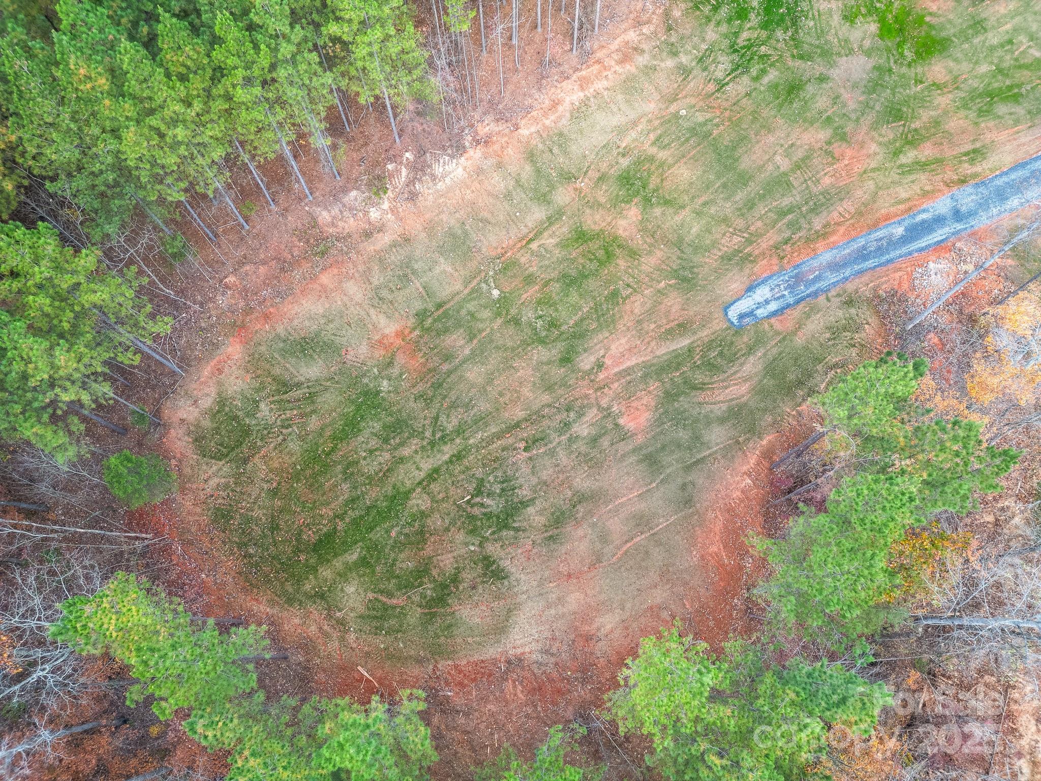 10300 Fink Road, Unit 1 Mount Pleasant, NC 28124 - Photo 5 of 7 a backyard of a house with lots of green space