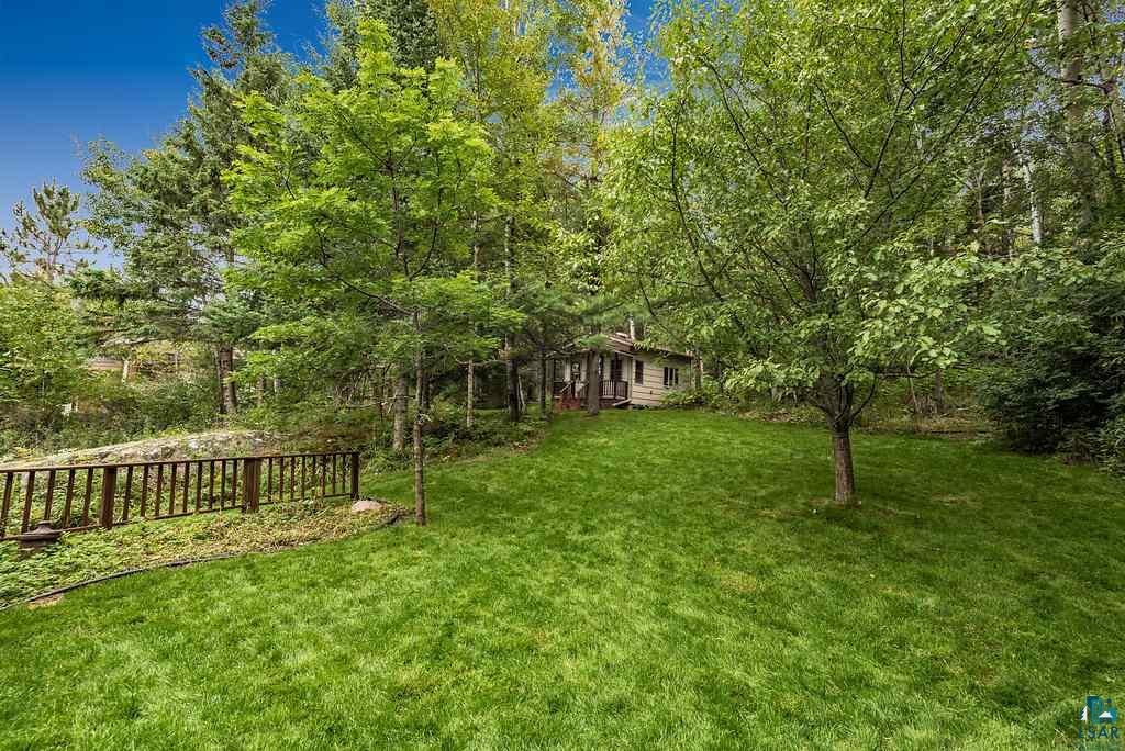 631 Ridgewood Road Duluth, MN 55804 - Photo 29 of 32 Beautiful Back Yard with underground lawn irrigation system
