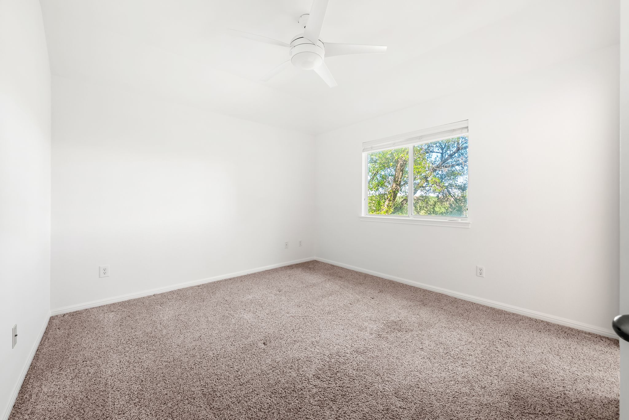2708 Rio Mesa Drive Austin, TX 78732 - Photo 25 of 40 an empty room with windows