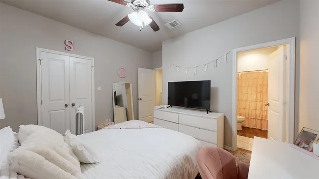 a view of a bathroom from a hallway