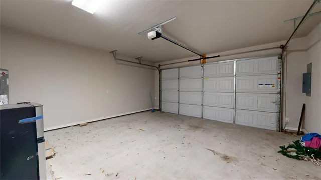 a front view of a house with a garage