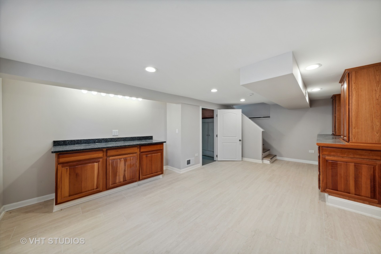7424 West Gregory Street Chicago, IL 60656 - Photo 14 of 17 a view of an empty room with a kitchen