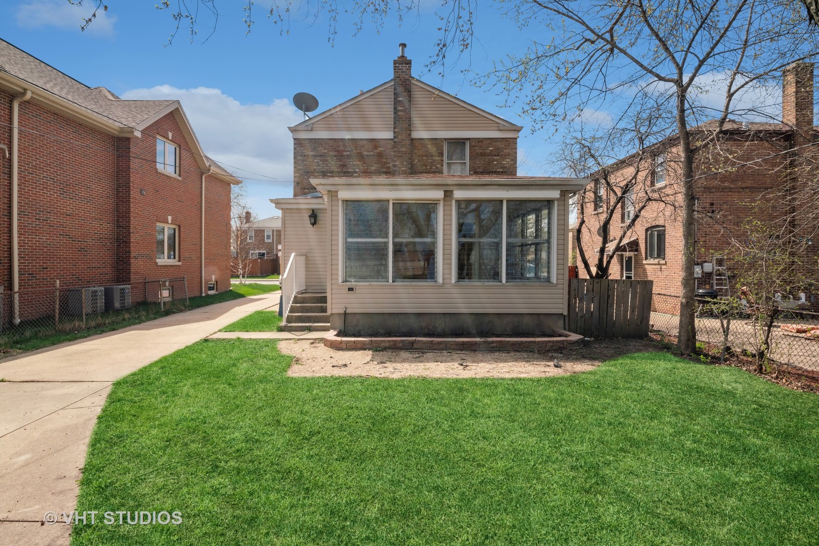 7424 West Gregory Street Chicago, IL 60656 - Photo 17 of 17 a view of a house with a yard and pathway