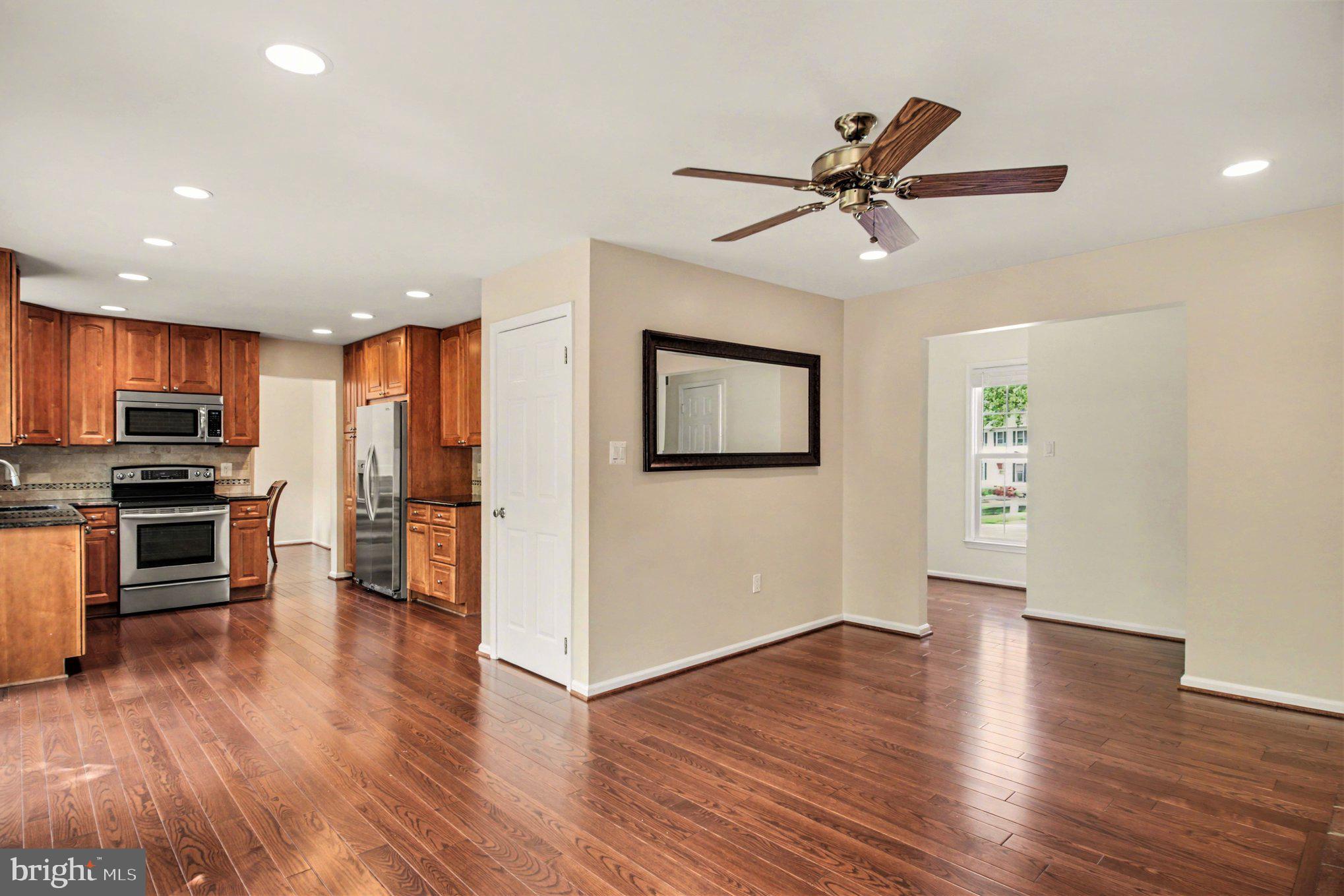 8309 Timber Brook Lane Springfield, VA 22153 - Photo 14 of 39 a view of kitchen with sink microwave and refrigerator
