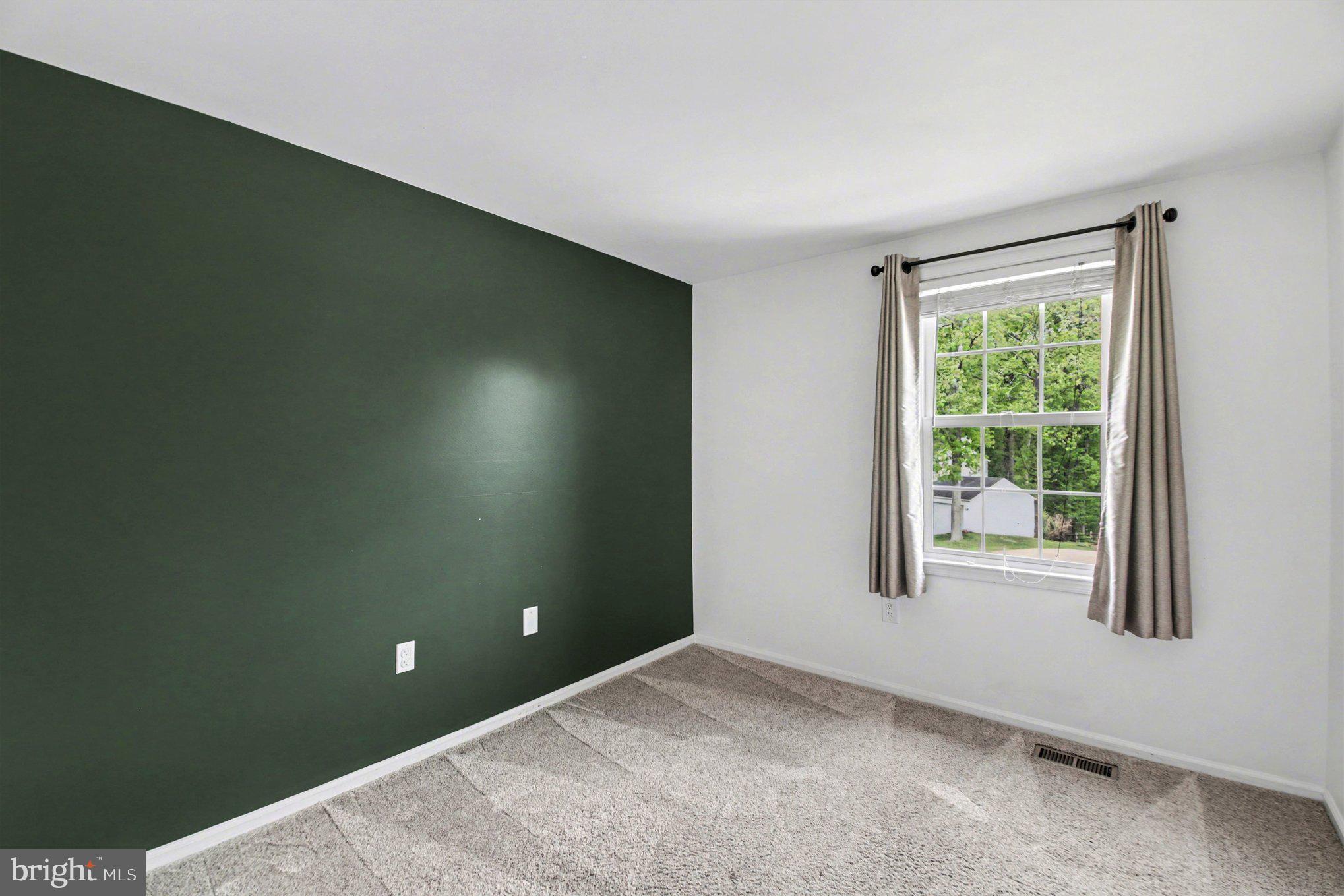 8309 Timber Brook Lane Springfield, VA 22153 - Photo 23 of 39 an empty room with windows