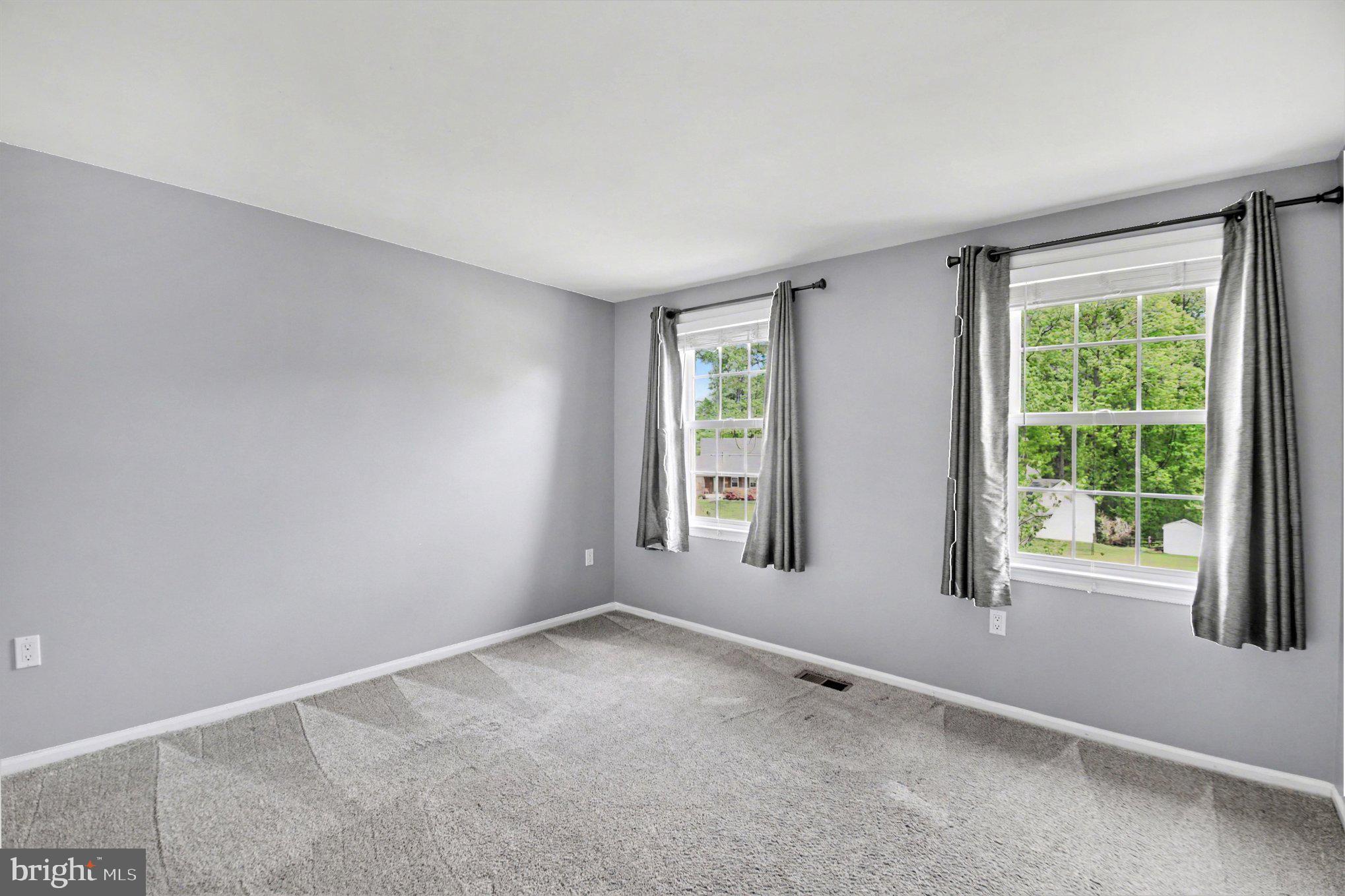 8309 Timber Brook Lane Springfield, VA 22153 - Photo 25 of 39 an empty room with windows