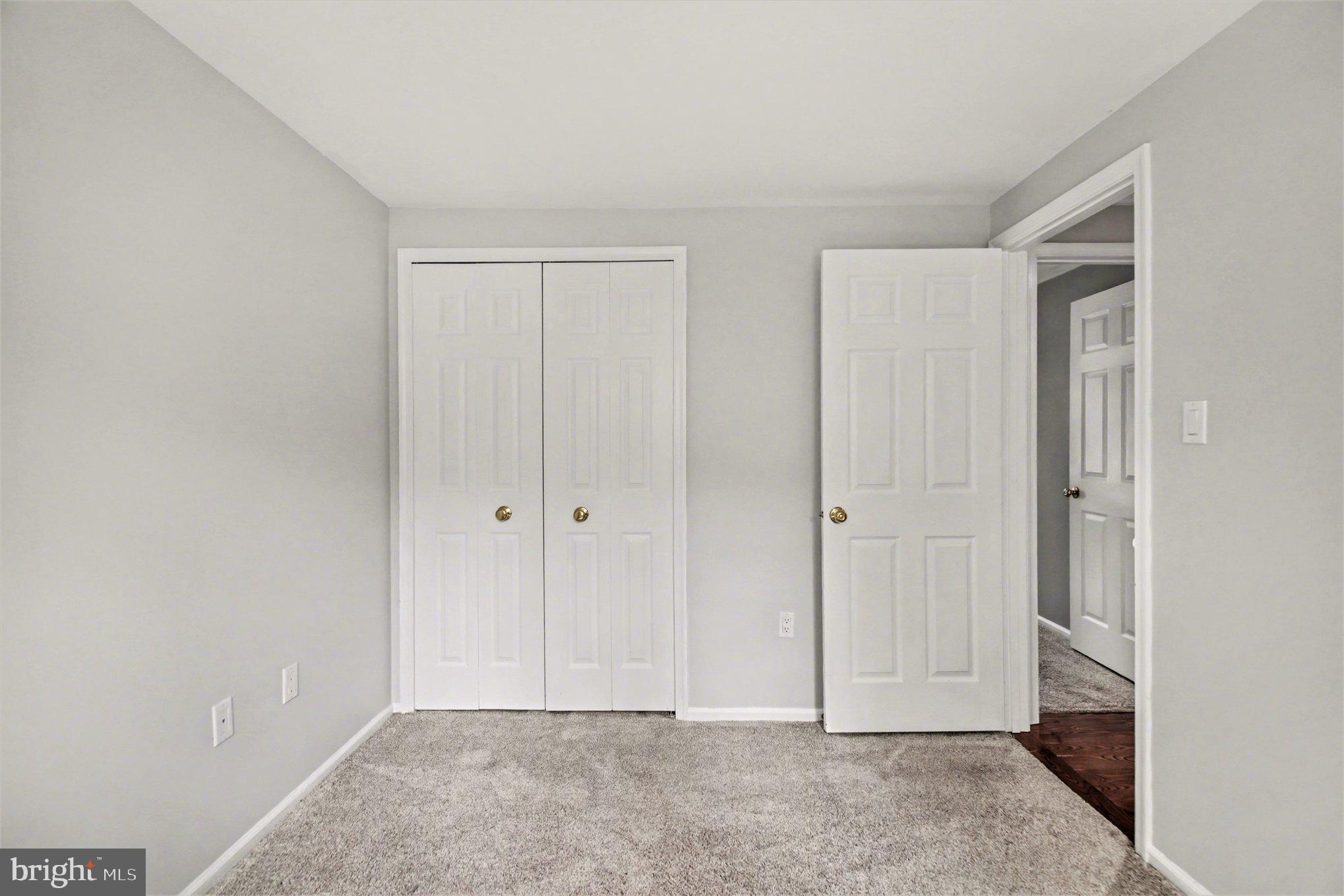 8309 Timber Brook Lane Springfield, VA 22153 - Photo 27 of 39 a view of room with hardwood floor and closet