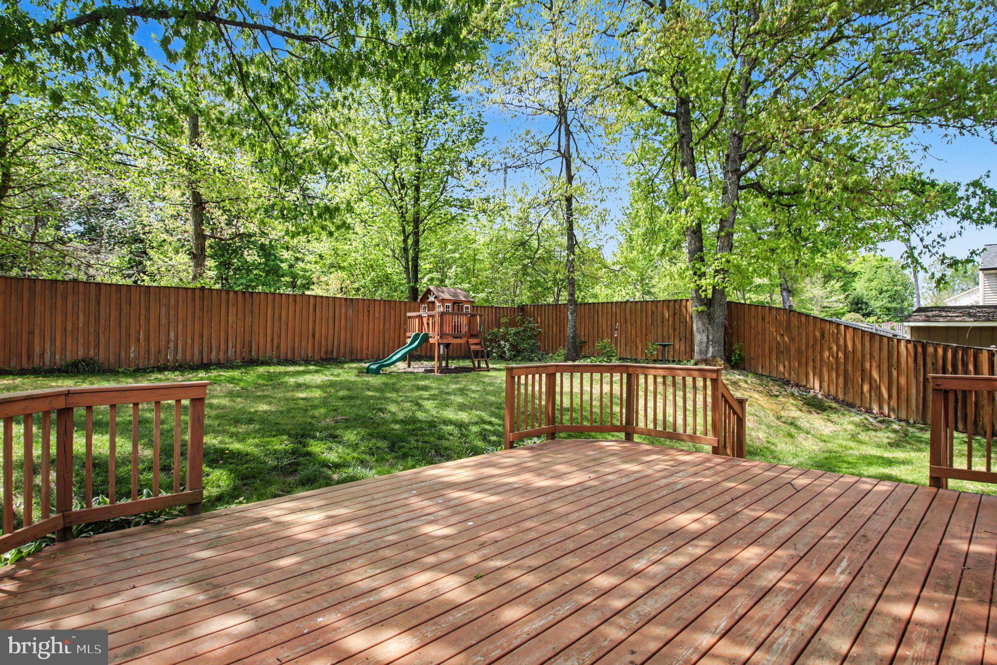 8309 Timber Brook Lane Springfield, VA 22153 - Photo 34 of 39 a balcony with wooden floor