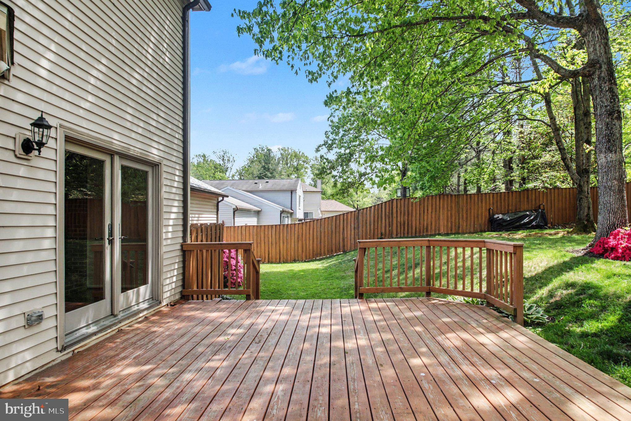 8309 Timber Brook Lane Springfield, VA 22153 - Photo 35 of 39 a view of a house with a yard