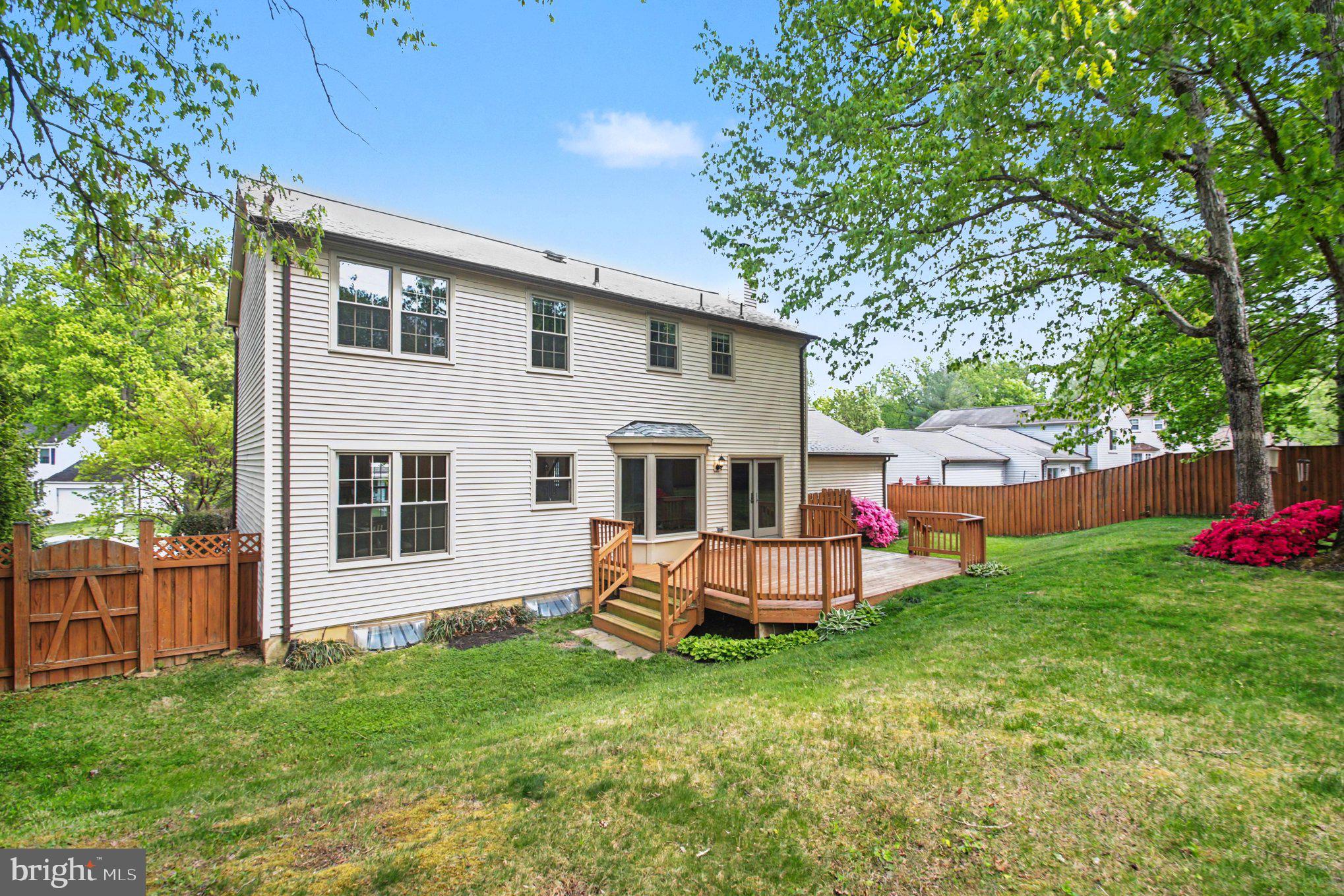 8309 Timber Brook Lane Springfield, VA 22153 - Photo 36 of 39 a front view of a house with garden