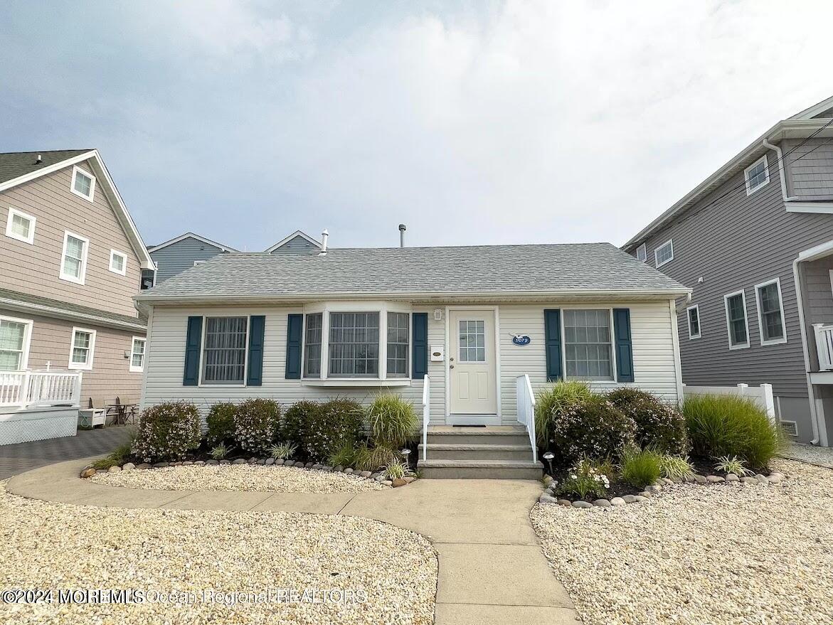 1707 R Baltimore Avenue Lavallette, NJ 08735 - Photo 11 of 11 a front view of a house with a yard