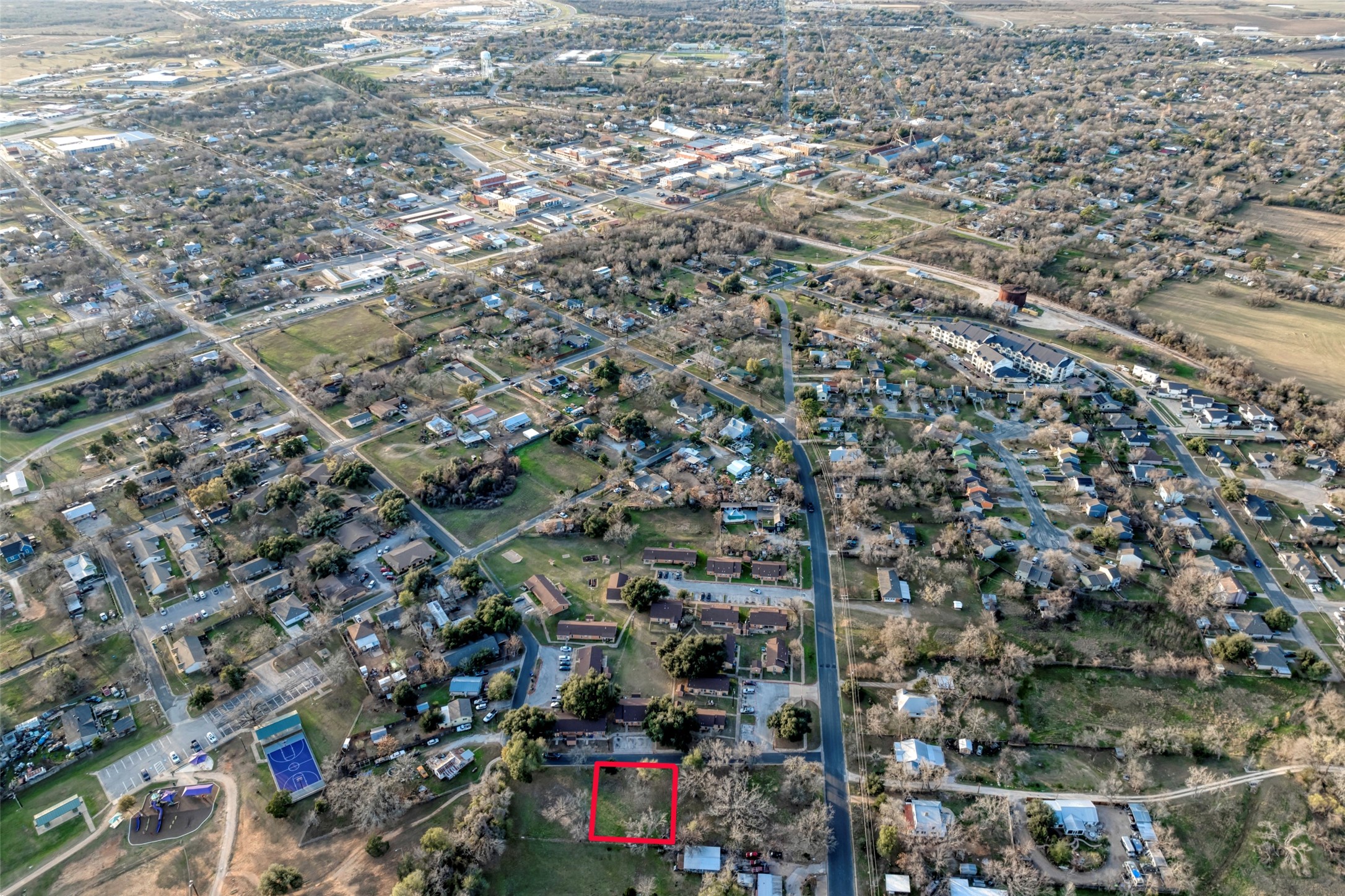Lot 3 East Alamo Street Elgin, TX 78621 - Photo 15 of 15 an aerial view of a city