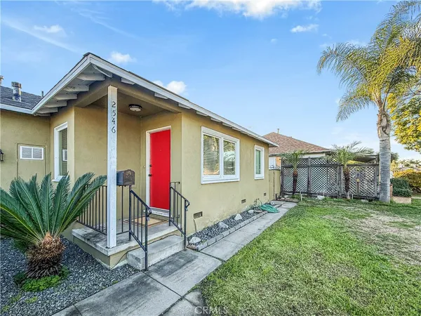 a house view with a garden space