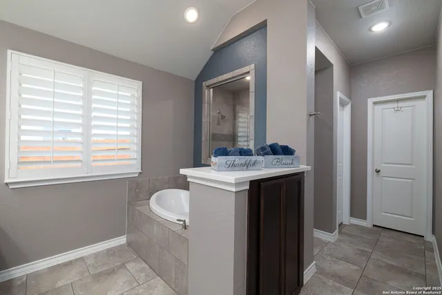 a bathroom with a sink toilet and vanity