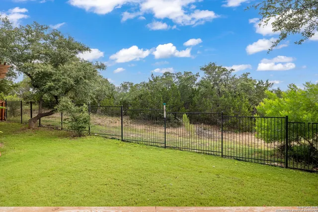 a view of a house with a yard porch and sitting area