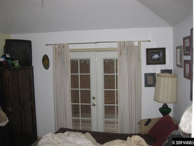 720 Plumas Street Reno, NV 89509 - Photo 8 of 8 a bedroom with furniture and a window