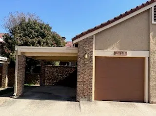 a front view of a house with yard
