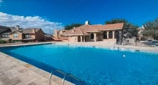 a view of a hallway with seating area