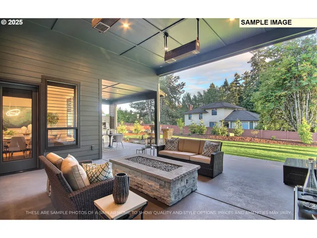 a living room with patio furniture and a large window