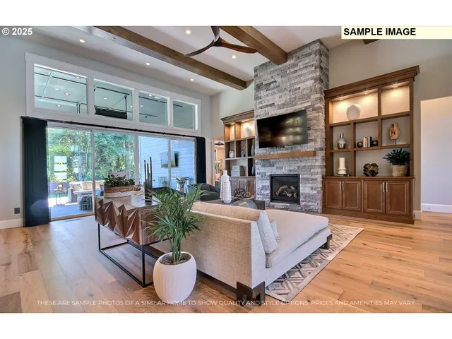 a living room with furniture fireplace and flat screen tv