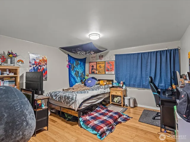 a bed room with a bed and furniture