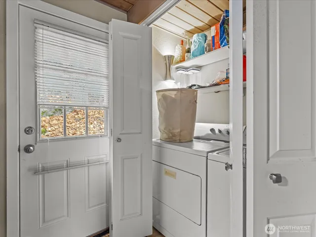 a front view of a house with chairs