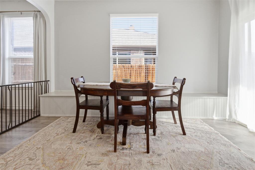 10928 Middleglen Road Fort Worth, TX 76052 - Photo 16 of 37 a view of a dining room with furniture and window