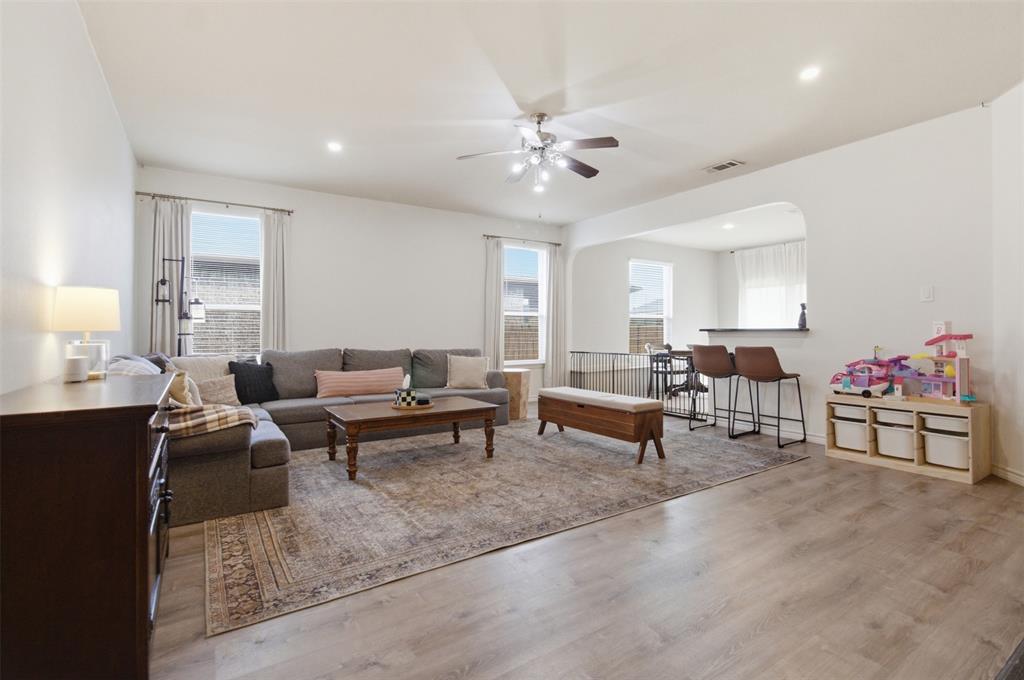 10928 Middleglen Road Fort Worth, TX 76052 - Photo 3 of 37 a living room with furniture and a large window