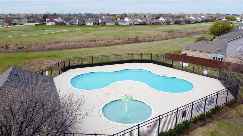 10928 Middleglen Road Fort Worth, TX 76052 - Photo 34 of 37 an aerial view of a house with a swimming pool yard and outdoor seating