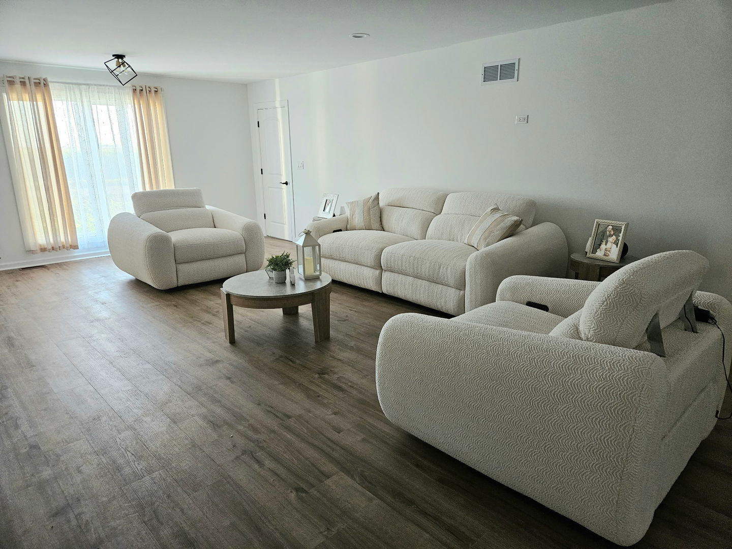 34769 Zilm Road Wilmington, IL 60481 - Photo 14 of 30 a living room with furniture and a large window