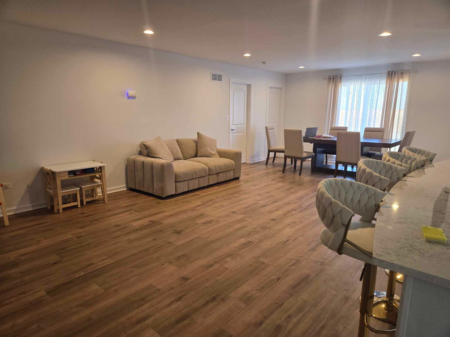 34769 Zilm Road Wilmington, IL 60481 - Photo 18 of 30 a living room with furniture and a wooden floor