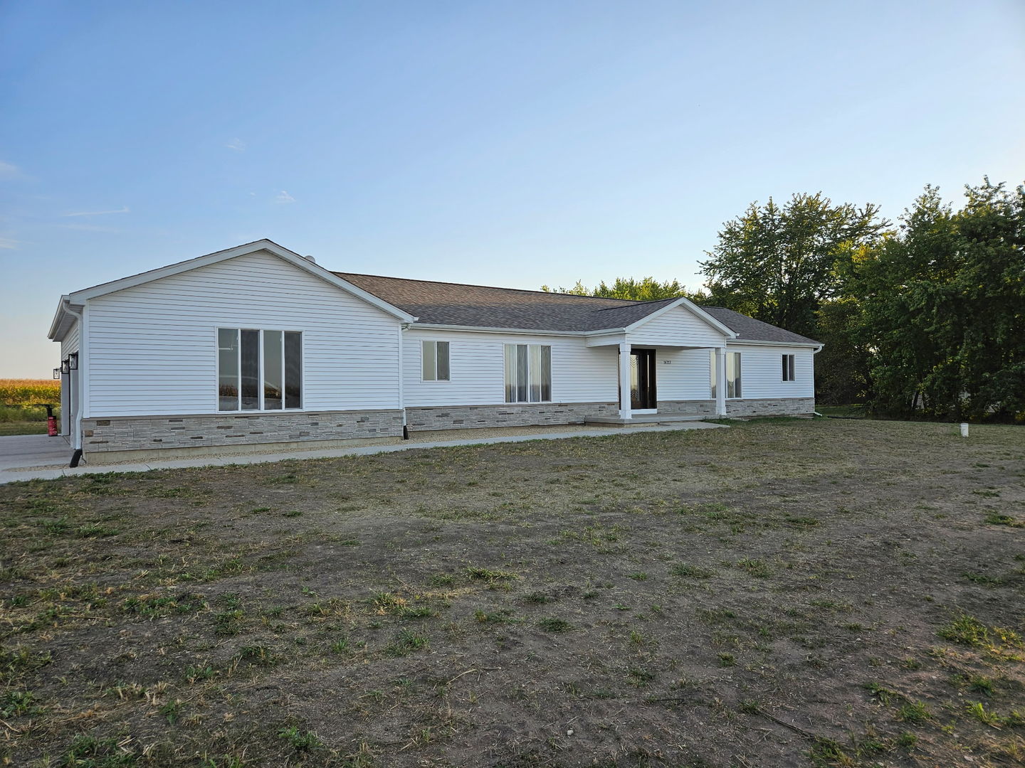 34769 Zilm Road Wilmington, IL 60481 - Photo 8 of 30 a house with trees in the background