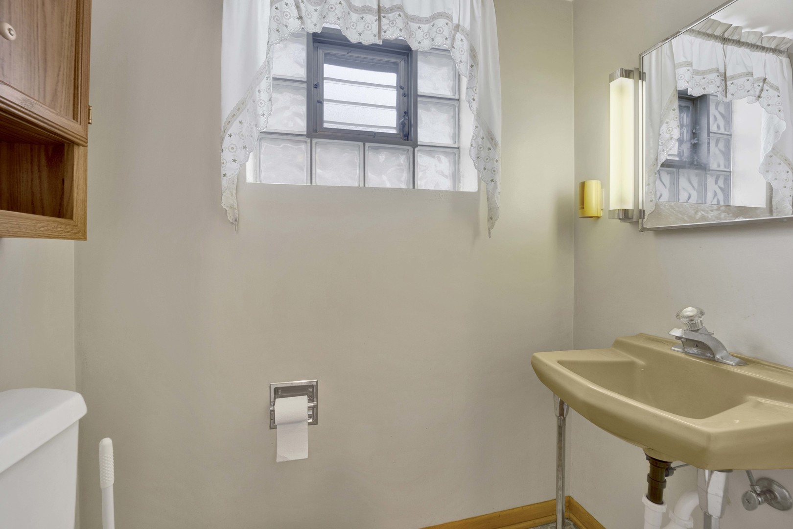 2223 South 7th Avenue North Riverside, IL 60546 - Photo 15 of 20 a bathroom with a sink and a toilet